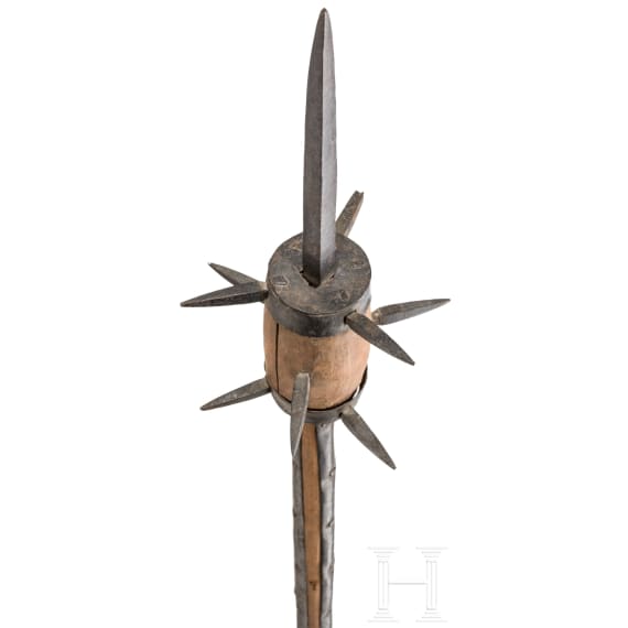A short South German flail with a cylindrical head, 16th/17th century.