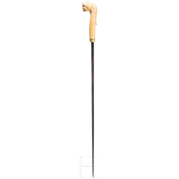 A Dutch or Flemish cane grip carved from sperm whale tooth, mid-18th century