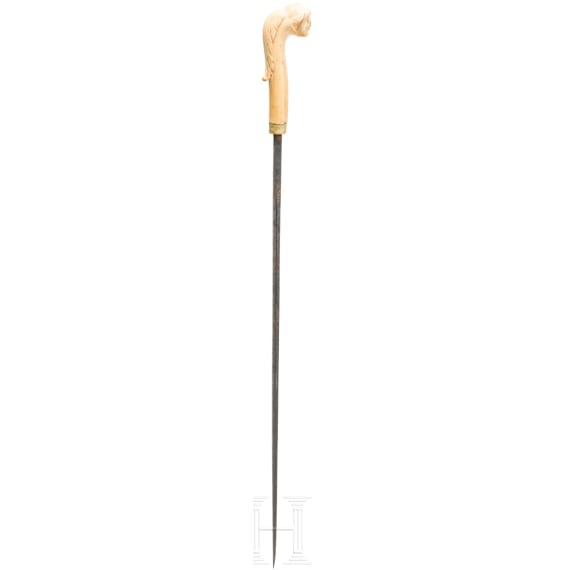 A Dutch or Flemish cane grip carved from sperm whale tooth, mid-18th century