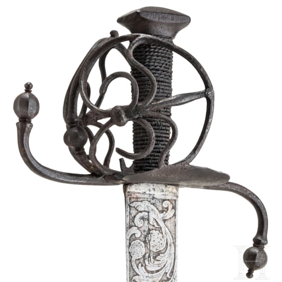A German landsknecht's basket-hilt sword with etched blade, ca. 1580