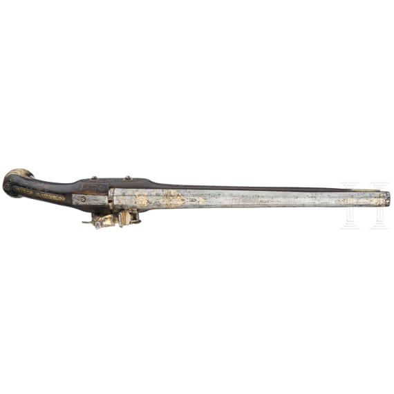 A Balkan Turkish gold-plated Miquelet flintlock pistol, 20th century, made using old parts
