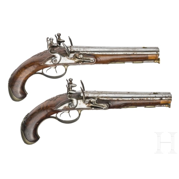 A French pair of double-barrelled flintlock pistols, circa 1800