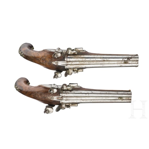 A French pair of double-barrelled flintlock pistols, circa 1800