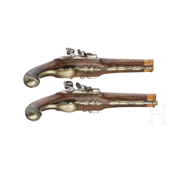 A French pair of double-barrelled flintlock pistols, circa 1800