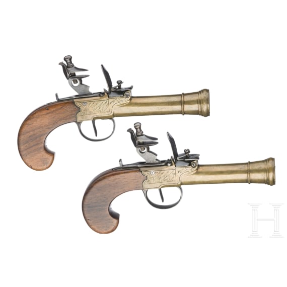 A pair of flintlock pocked pistols with brass blunderbuss barrels, probably from Belgium, circa 1800