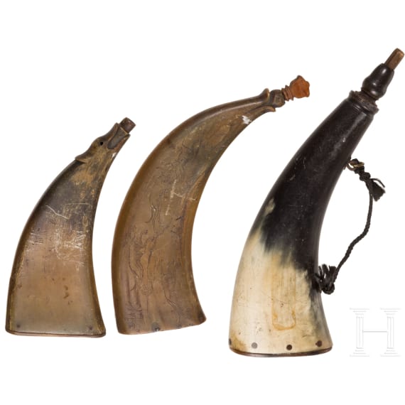 Three German horn powder flasks, mid-18th century
