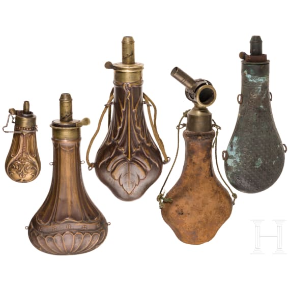 Five copper powder flasks, including three by James Dixon & Son&rsquo;s of Sheffield, second half of the 19th century