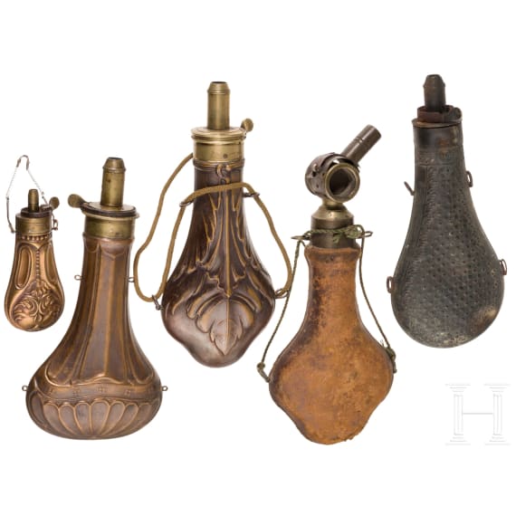 Five copper powder flasks, including three by James Dixon & Son&rsquo;s of Sheffield, second half of the 19th century