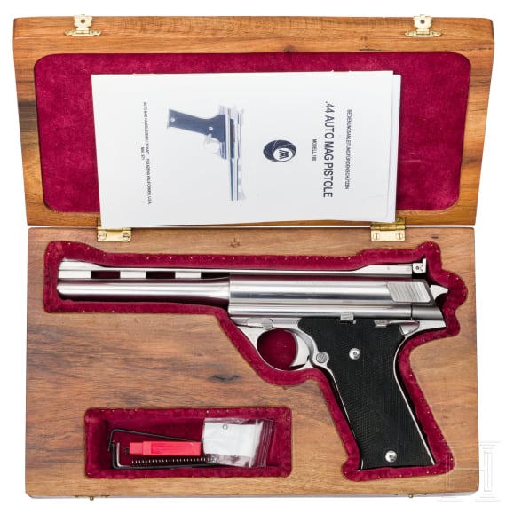 An AUTO MAG Mod. 180 Stainless, in case