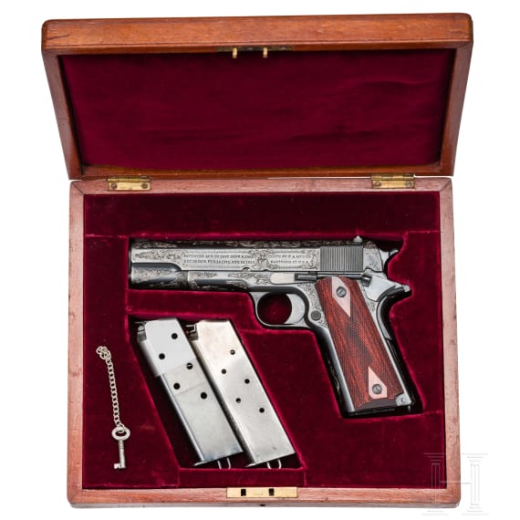 A Colt Government Model, engraved, in case
