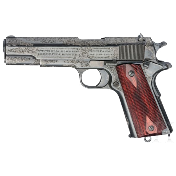 A Colt Government Model, engraved, in case