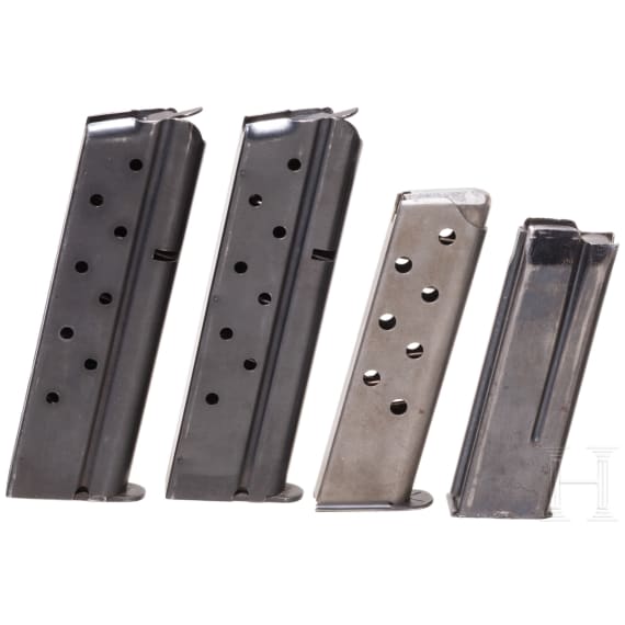 Four magazines (Colt Government, Savage 1907, Mauser HSc)