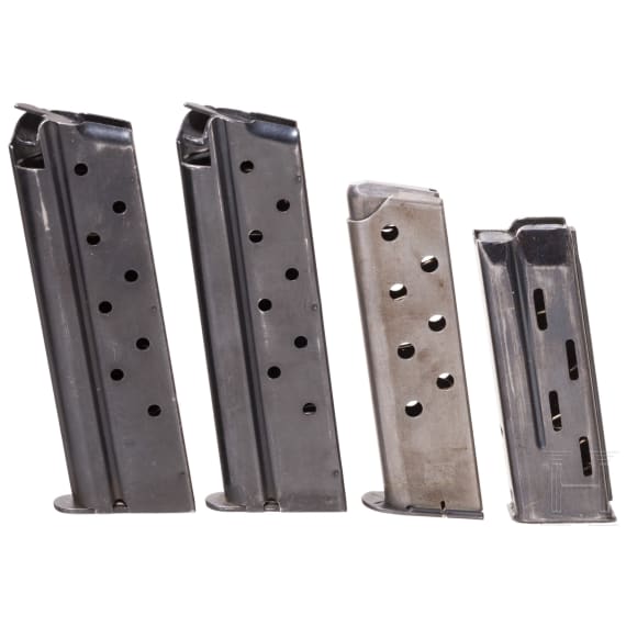 Four magazines (Colt Government, Savage 1907, Mauser HSc)