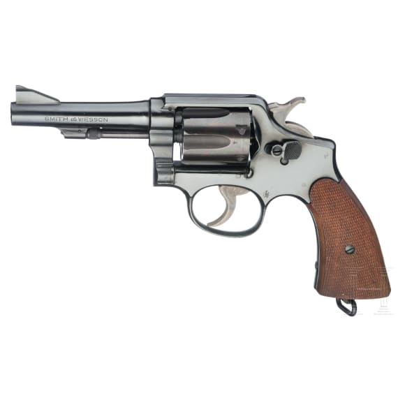 A Smith & Wesson Mod. Victory, with holster