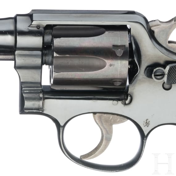 A Smith & Wesson Mod. Victory, with holster