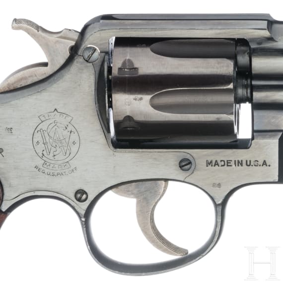 A Smith & Wesson Mod. Victory, with holster
