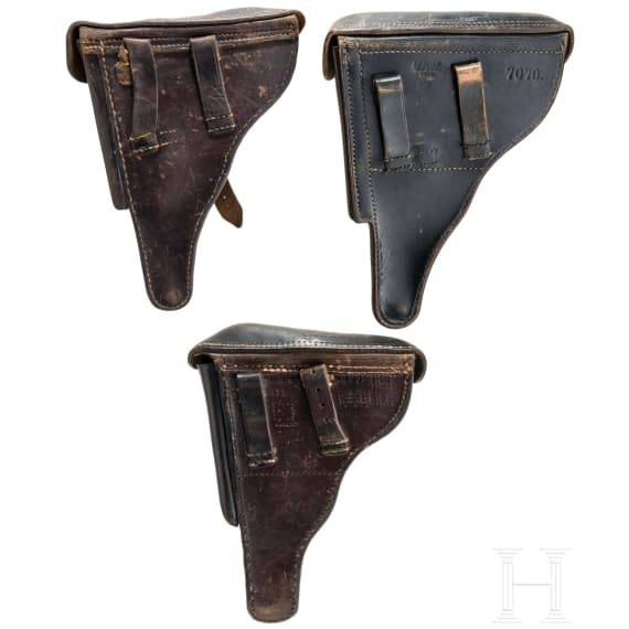 Three Luger holsters