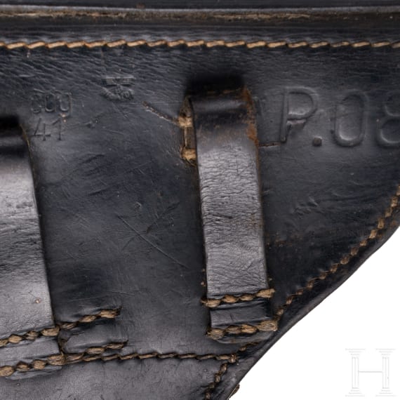Two Luger holsters, WW II
