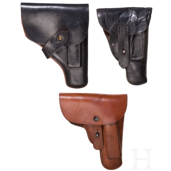 Three pistol holsters