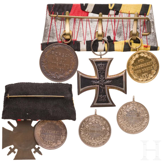 Two order clasps and two medals of merit