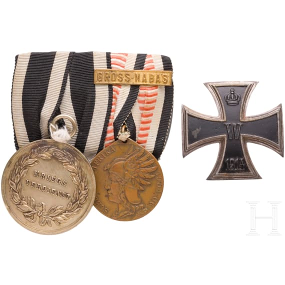 Two-piece colonial medal buckle and an Iron Cross, 1st Class, 1914