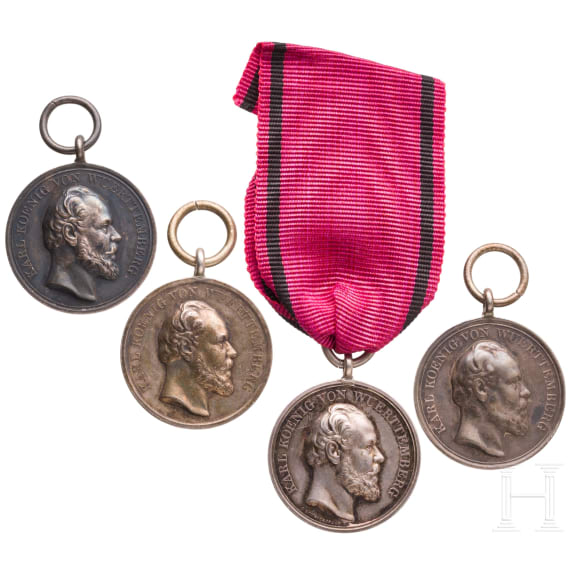 Four silver King Karl Civil Service Medals