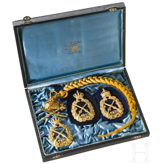 A Imperial Shooting Cord and three Imperial Shooting Badges, dated 1909 and 1910