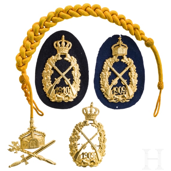 A Imperial Shooting Cord and three Imperial Shooting Badges, dated 1909 and 1910