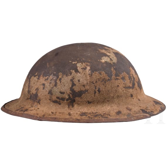 A MK I &ldquo;Brodie&rdquo; steel helmet, an early production model with an additional rail for the face guard