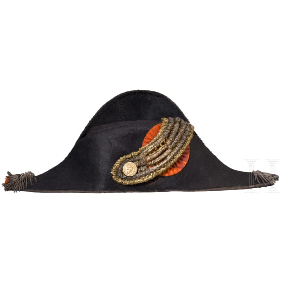A bicorne hat and a pair of epaulettes for naval officers, circa 1900