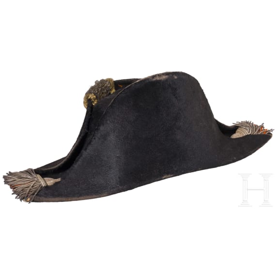 A bicorne hat and a pair of epaulettes for naval officers, circa 1900