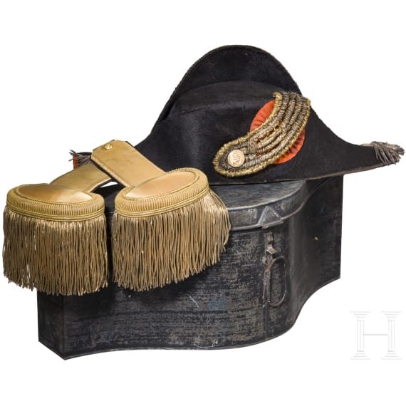 A bicorne hat and a pair of epaulettes for naval officers, circa 1900
