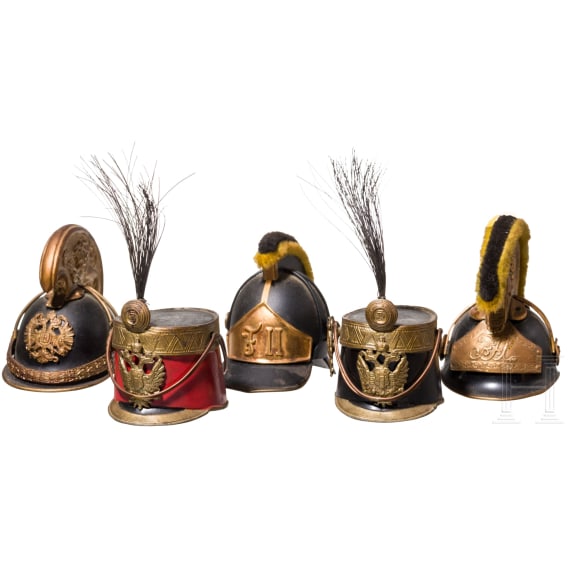 Five Austrian miniature helmets (ball donations), second half of the 20th century