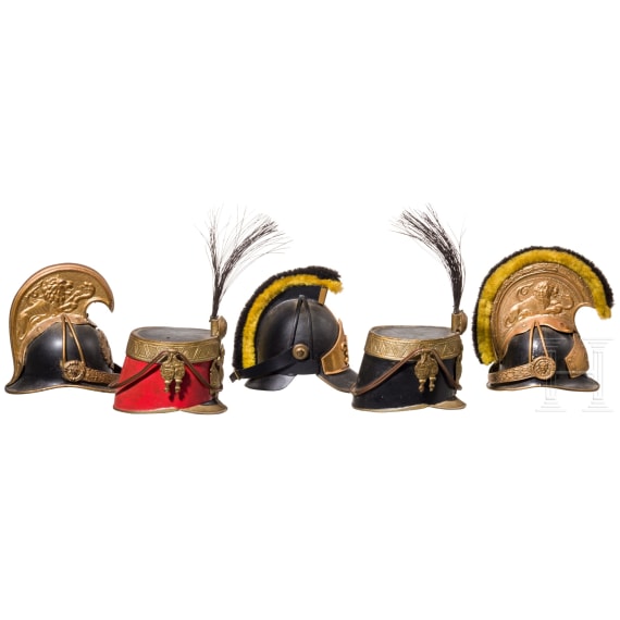Five Austrian miniature helmets (ball donations), second half of the 20th century