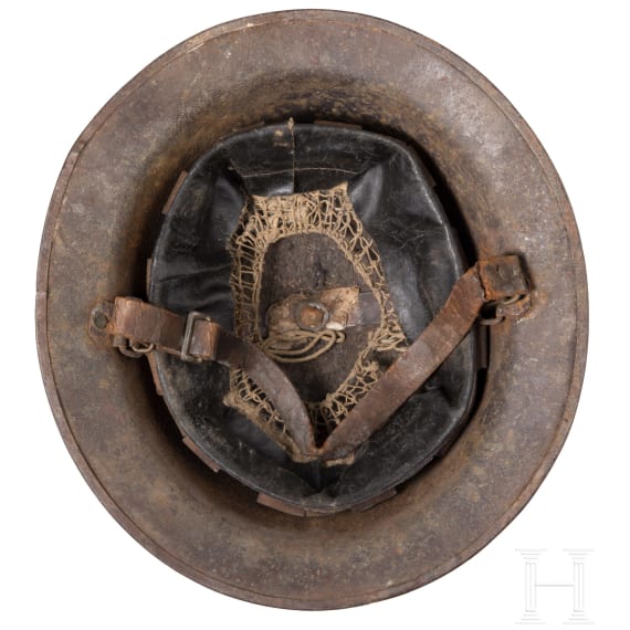 A steel helmet M 17 "Brodie" of a veteran of the 89th Infantry Division