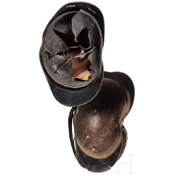 Four fragmentary M 1848 helmets of the Landwehr infantry