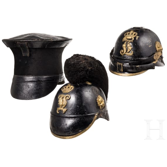 Two fragmentary helmets M 1868 and a shako body, 19th century