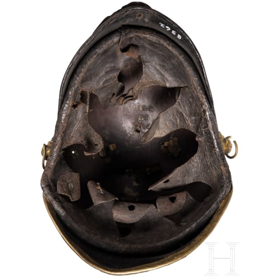 Two fragmentary helmets M 1868 and a shako body, 19th century