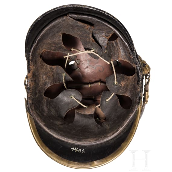 Two fragmentary helmets M 1868 and a shako body, 19th century
