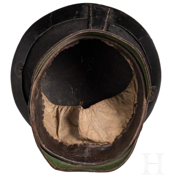 Two fragmentary helmets M 1868 and a shako body, 19th century