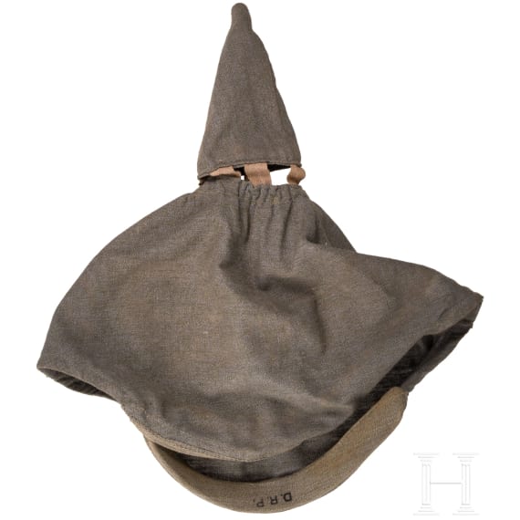 A helmet M 1886 for infantry reserve officers with its field-grey cover and orders