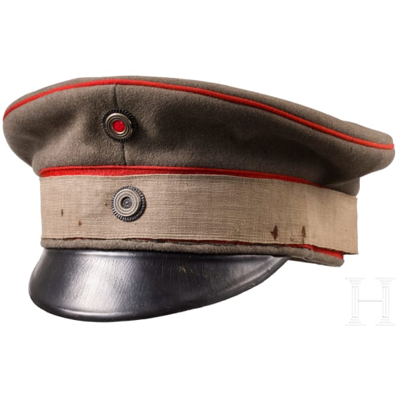 A field-grey visor cap for officers of the Prussian army with camouflage ribbon