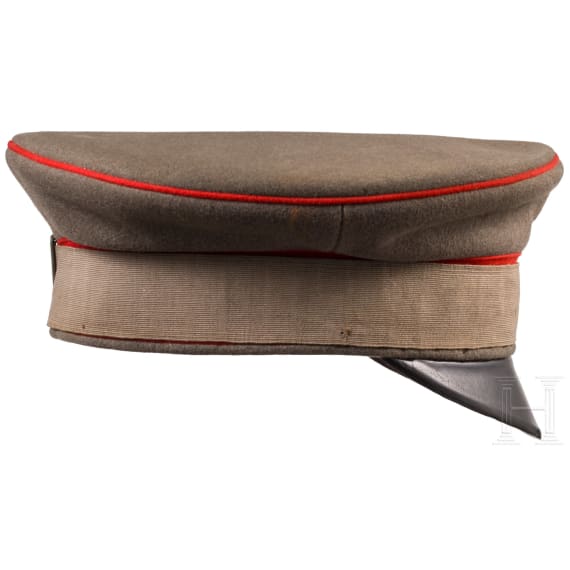 A field-grey visor cap for officers of the Prussian army with camouflage ribbon