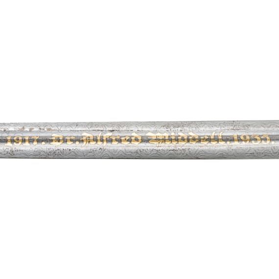 A dagger for officers of the Imperial Navy, with a damask blade and a gold inscription reading "1917. Dr Alfred Middell. 1935."