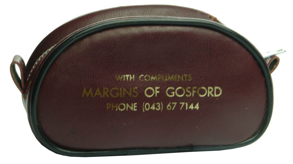Leather case with shoe cleaning outfit. Margins, Gosford advertising.