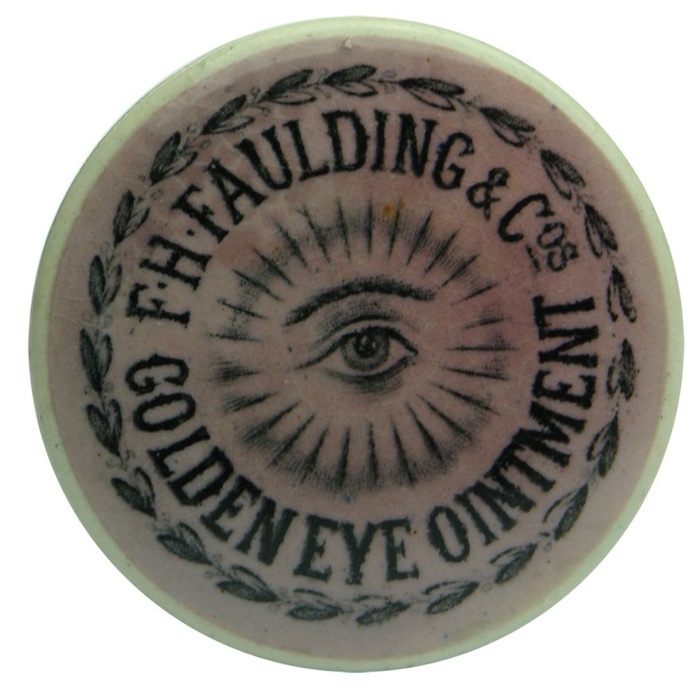 F. H. Faulding & Cos Golden Eye Ointment Pot Lid, Black Print on Pink Lid.