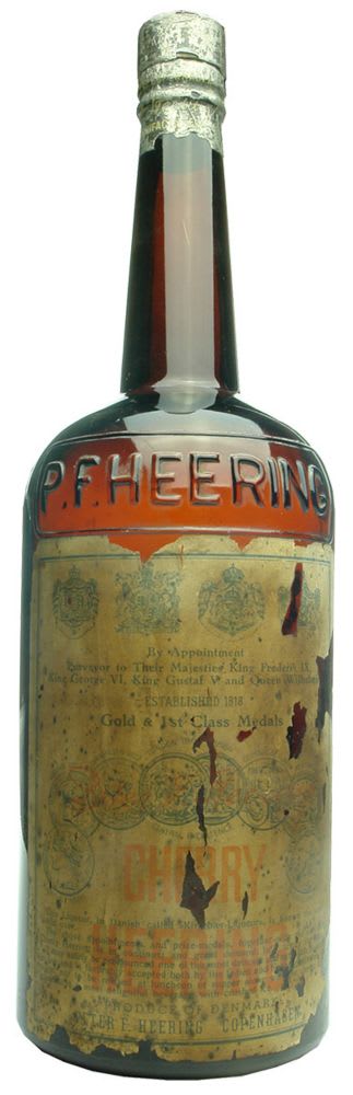 GIANT P. F. Heering, Copenhagen display bottle with lead seal and label.