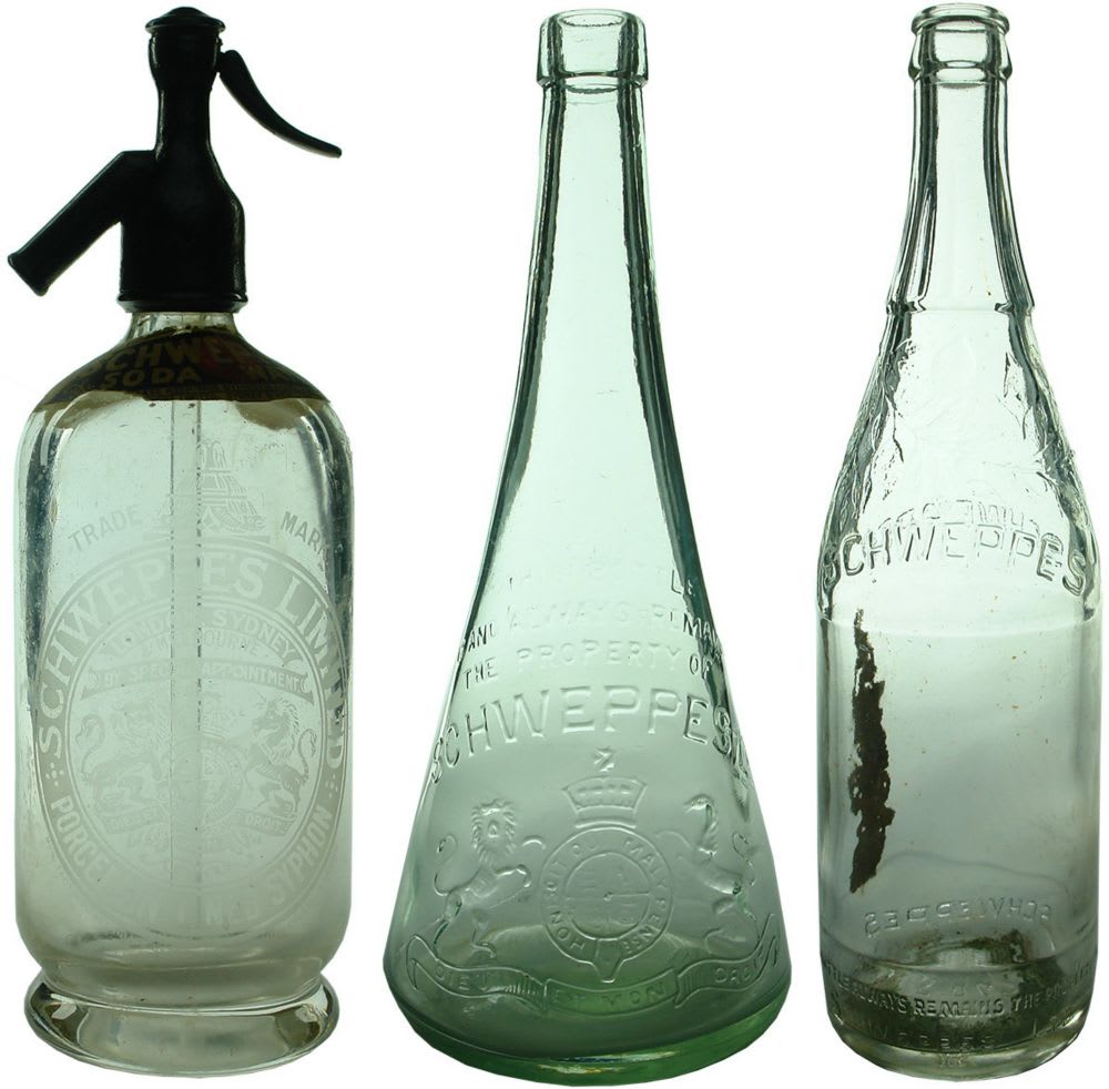 Three different Schweppes bottles. Soda Syphon, Cordial and Crown Seal.