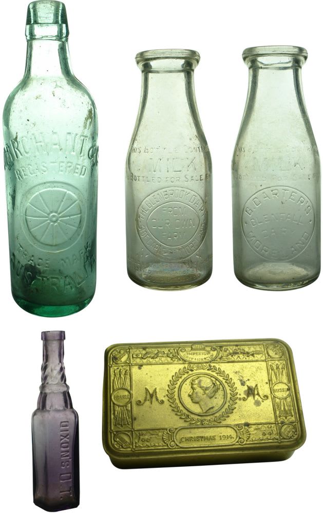 Four bottles and a tin. Marchant 26 oz Lamont. Two different Moreland milks. Sample OT Cordial. 1914 Christmas Cake Tin.