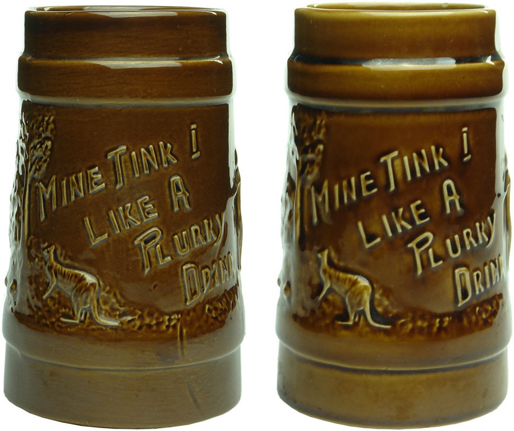 Pair of Fowler Pottery novelty mugs